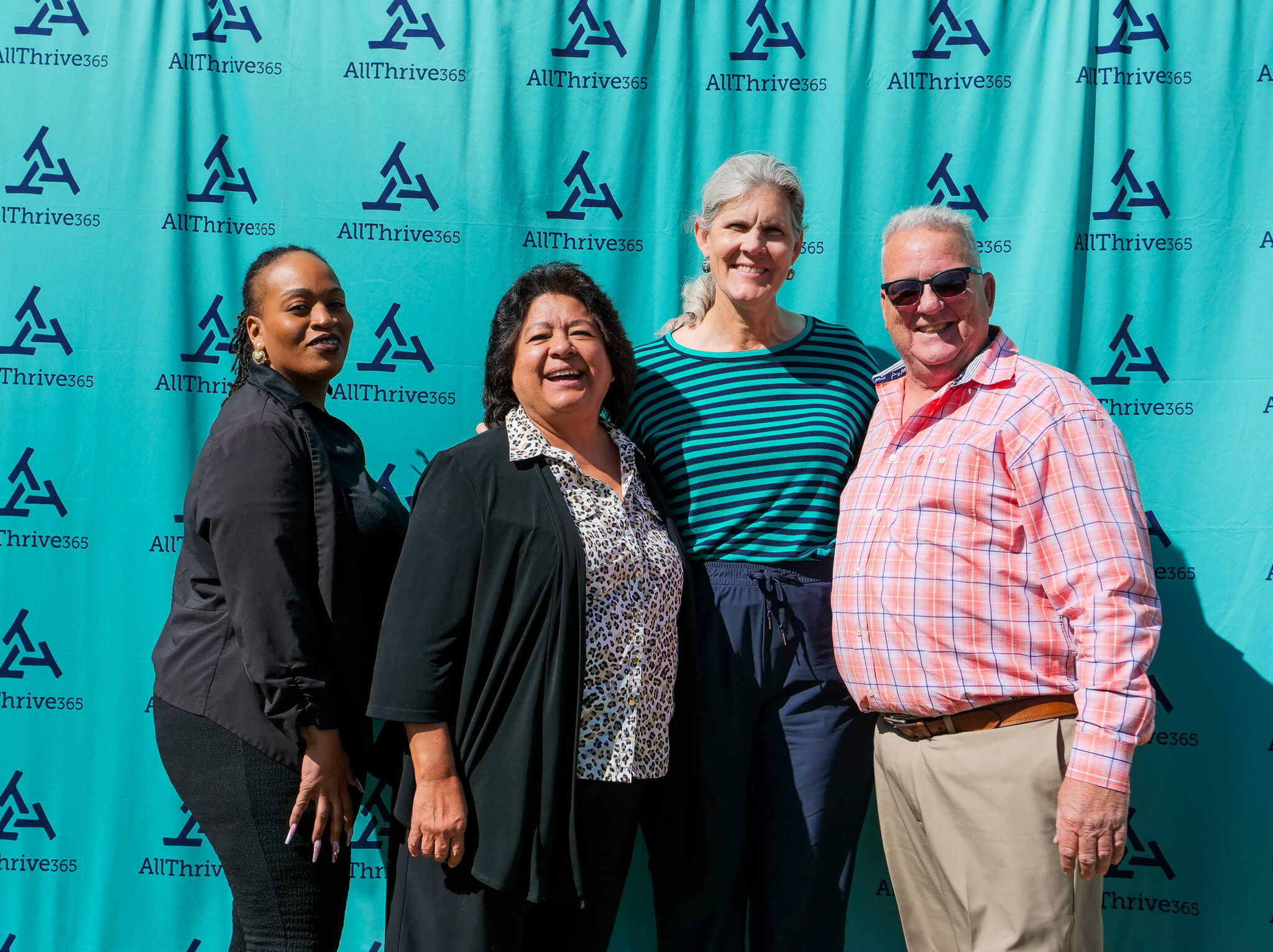 A group of staff posing for a group photo